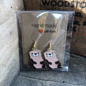 New otter earrings